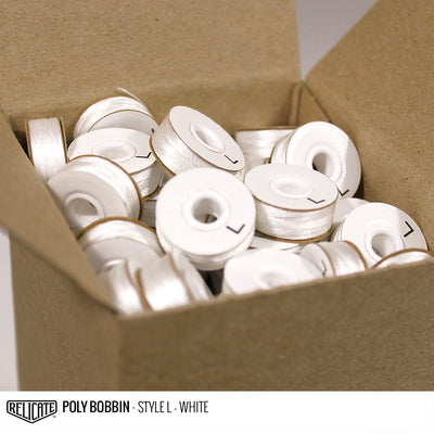 Magnetic Core Style L White Polyester Bobbins - 148 yards per